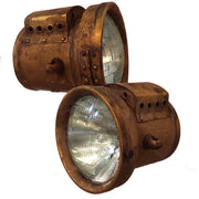 brass headlights with a patina finish